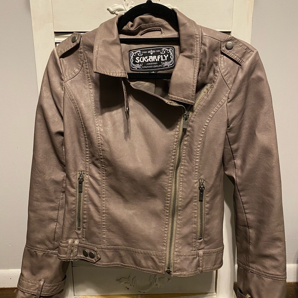 Taupe leather jacket only wore once! It’s in wonderful condition!